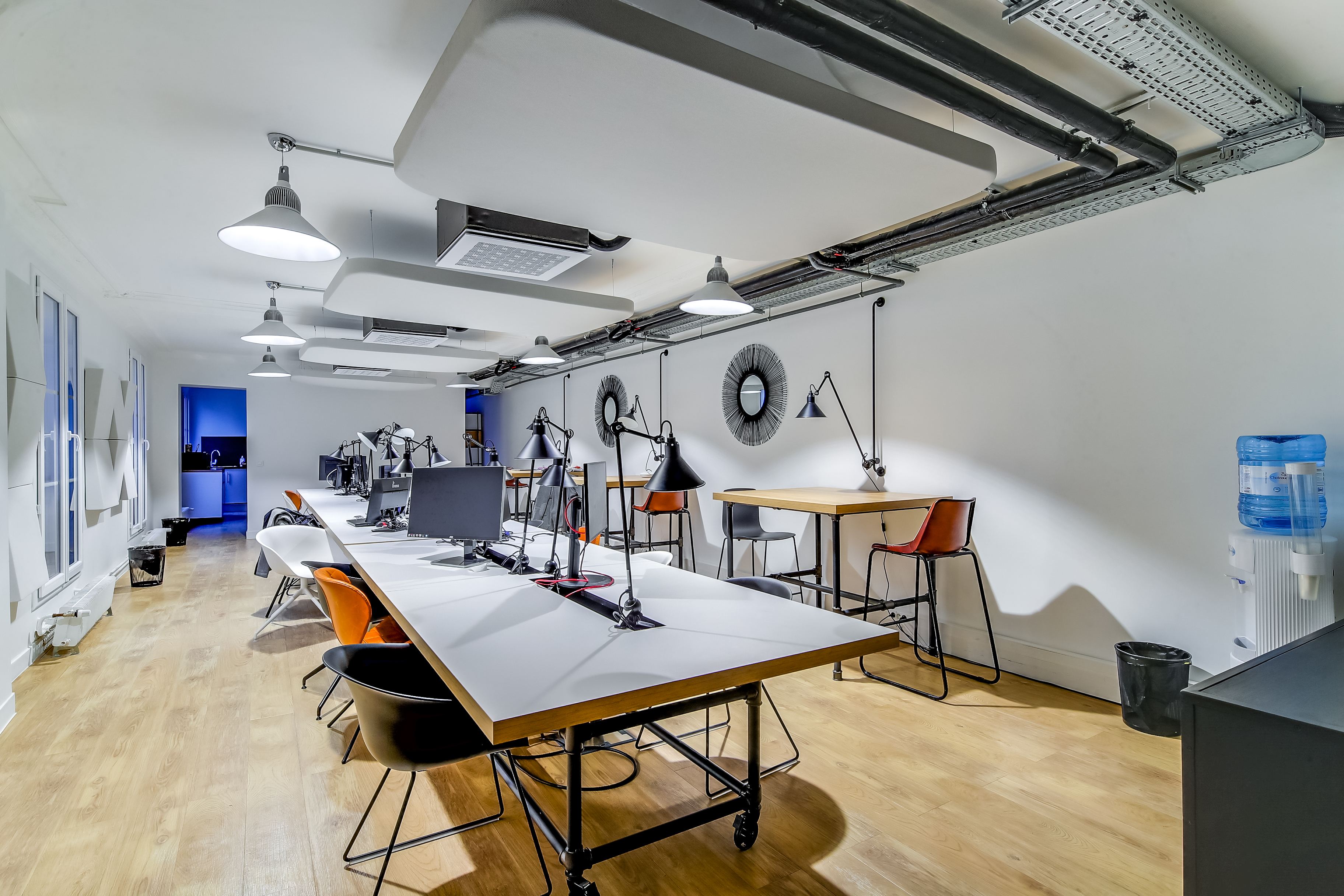 Open space des bureaux Flexmind à Paris aménagé par Isospace