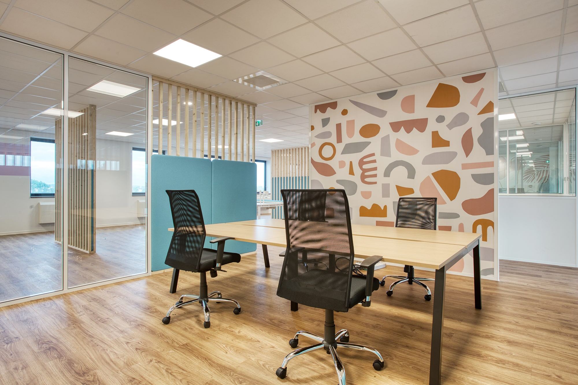 Open space des bureaux Elyst Consulting à Palaiseau par Isospace