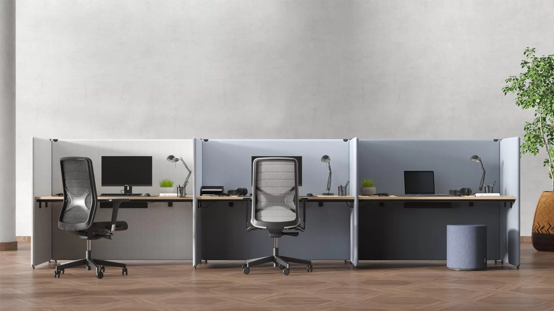 Trois postes individuels séparés par des écrans acoustiques absorbants