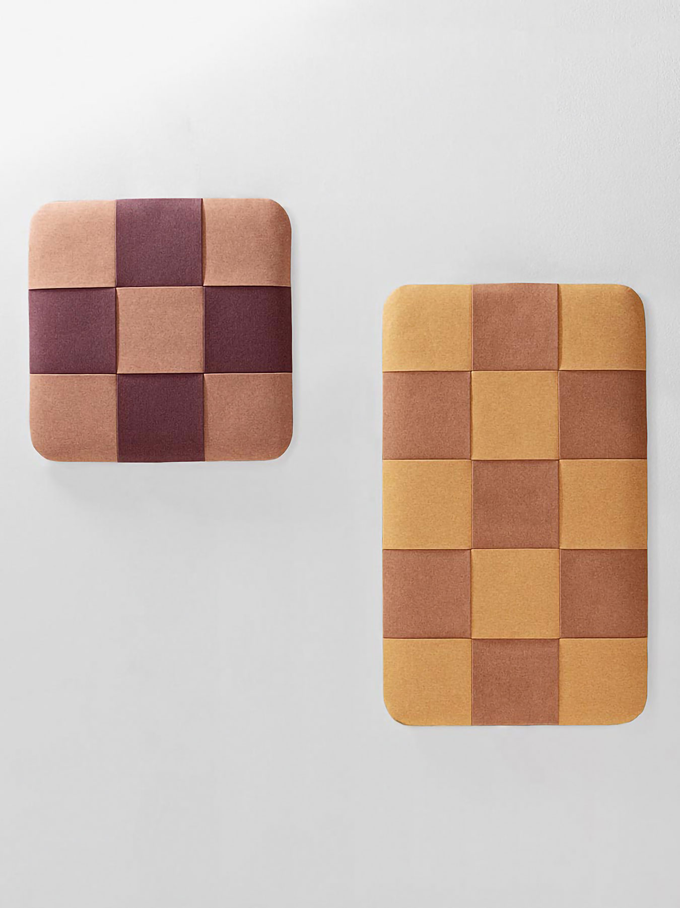 Cloison acoustique design habillée d'un textile capitonné bicolore
